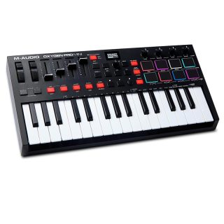 Controlador MIDI USB de 32 Teclas con 8 Beat Pads